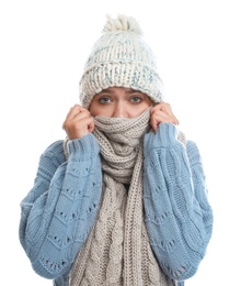 Young woman suffering from cold on white background