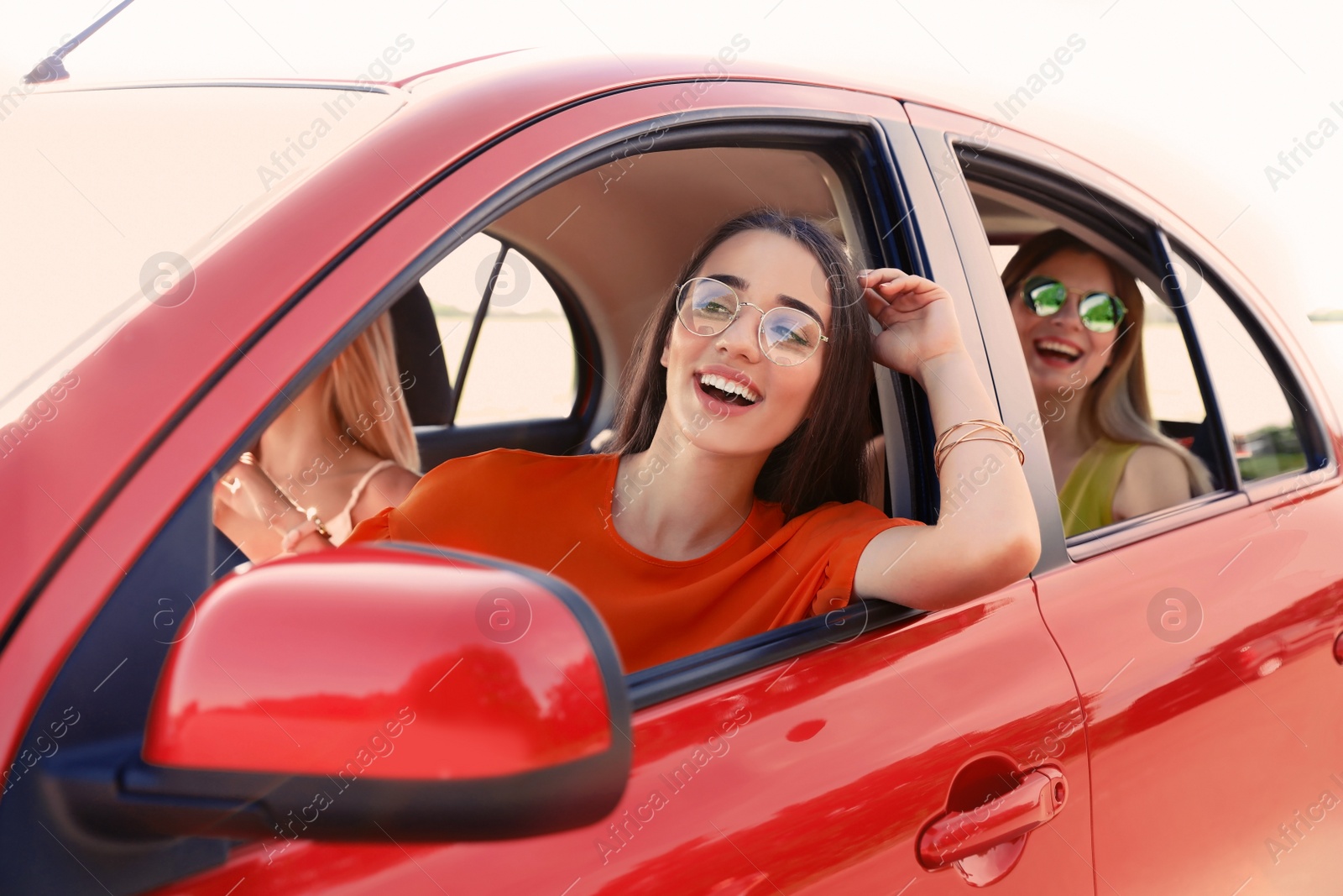 Photo of Happy beautiful young women together in car