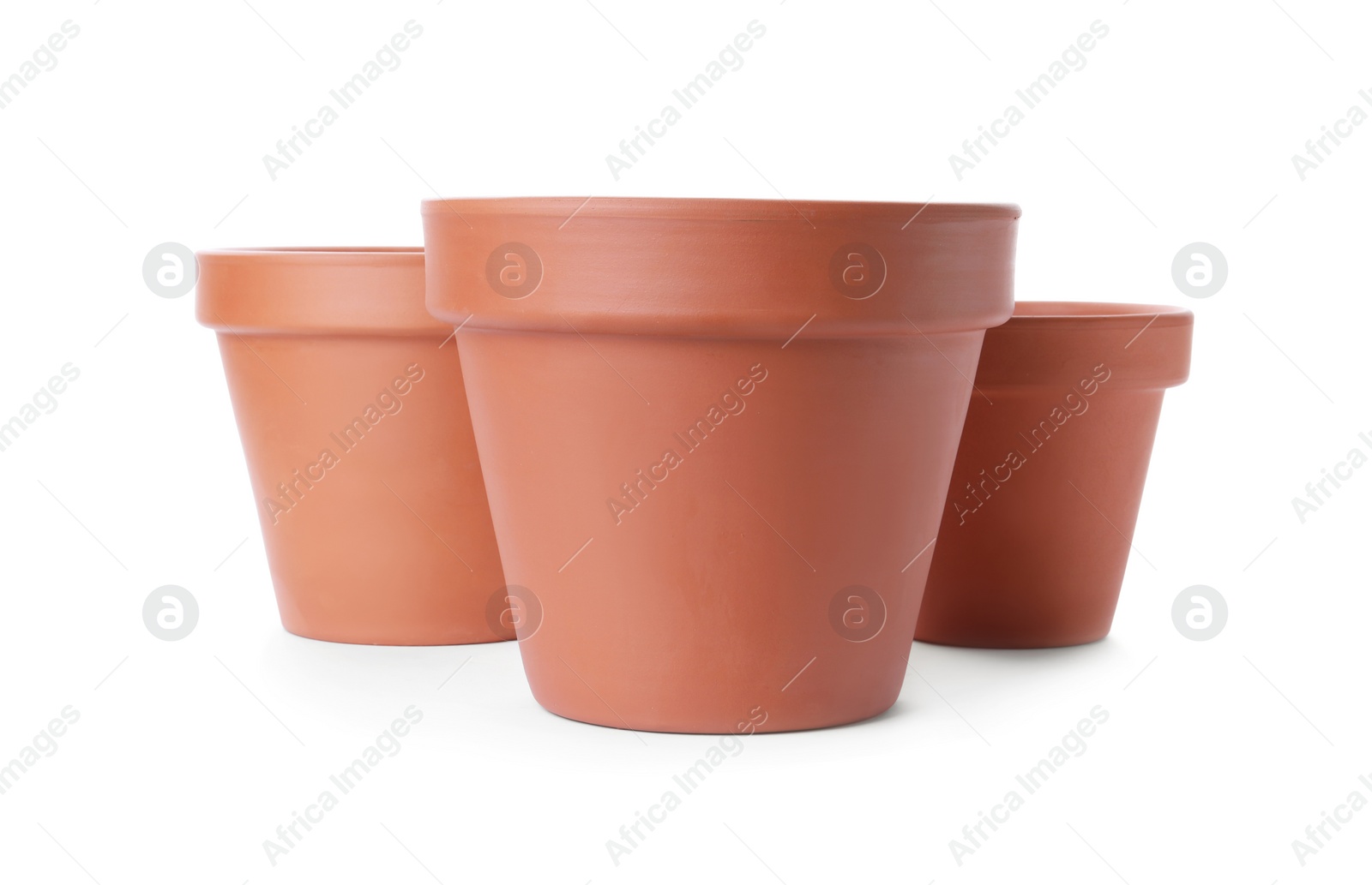 Photo of Stylish terracotta flower pots isolated on white