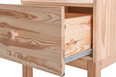 Photo of Wooden small cabinet with open drawer on white background, closeup. Furniture for wardrobe room