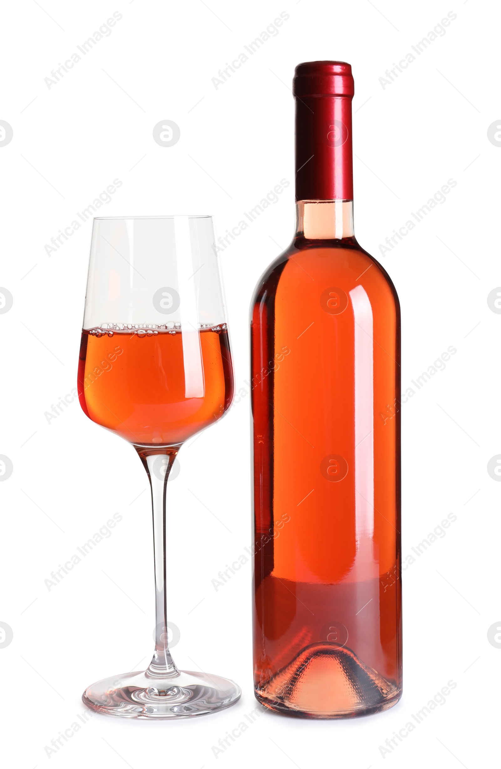 Photo of Glass and bottle of delicious wine on white background