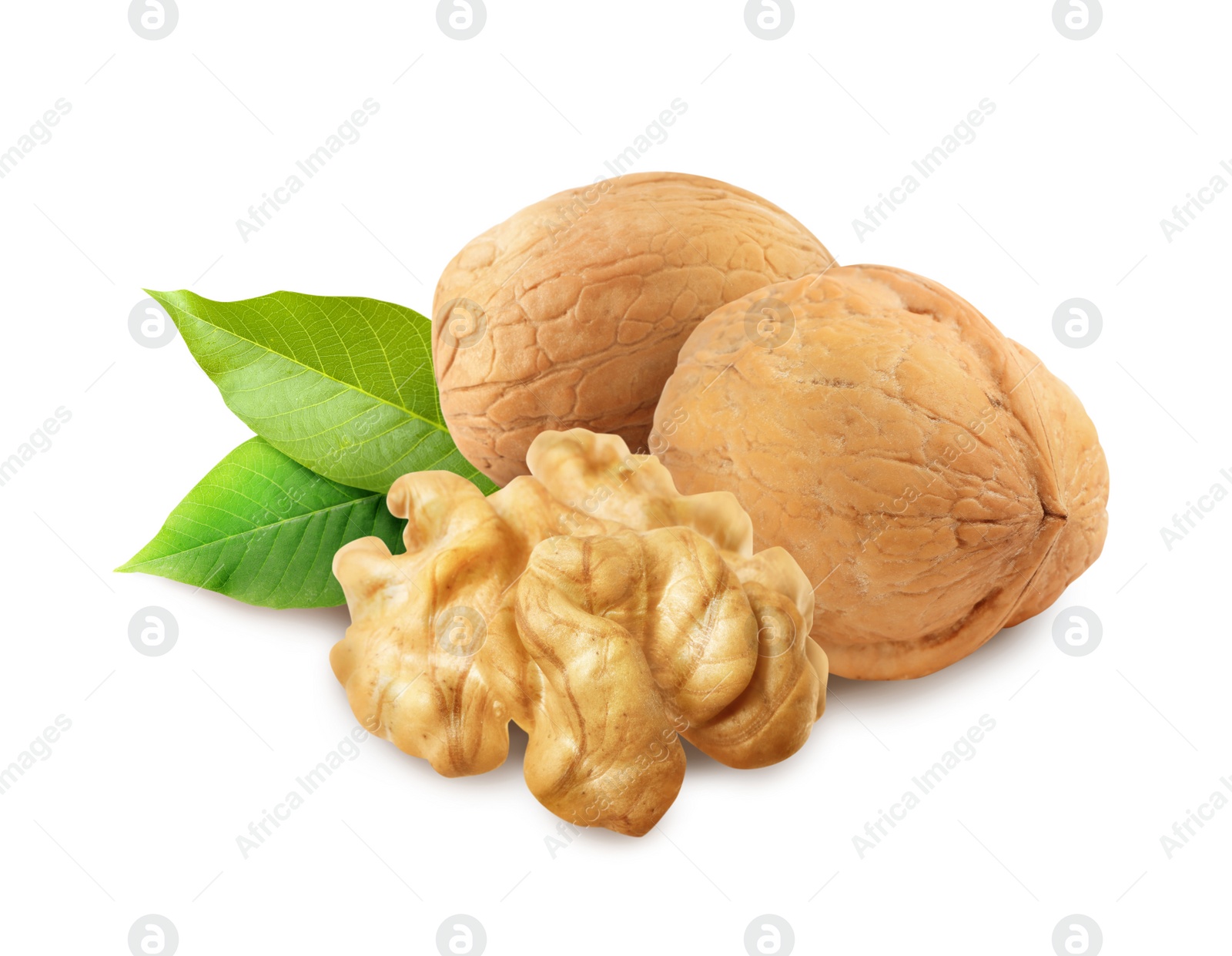 Image of Tasty walnuts and green leaves on white background