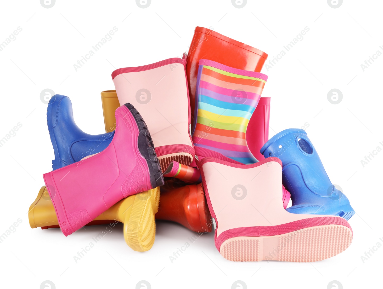 Photo of Pile of different female gumboots isolated on white