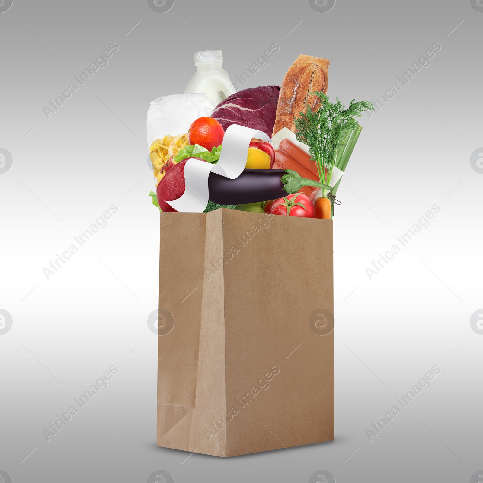 Image of Paper bag with different products and receipt on grey gradient background