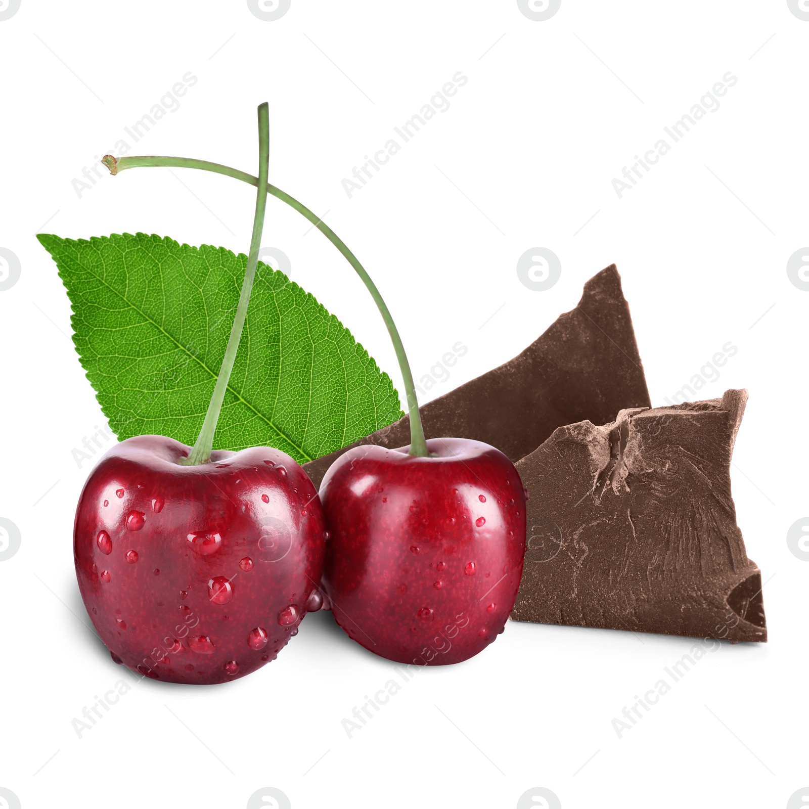 Image of Fresh cherries and pieces of dark chocolate isolated on white