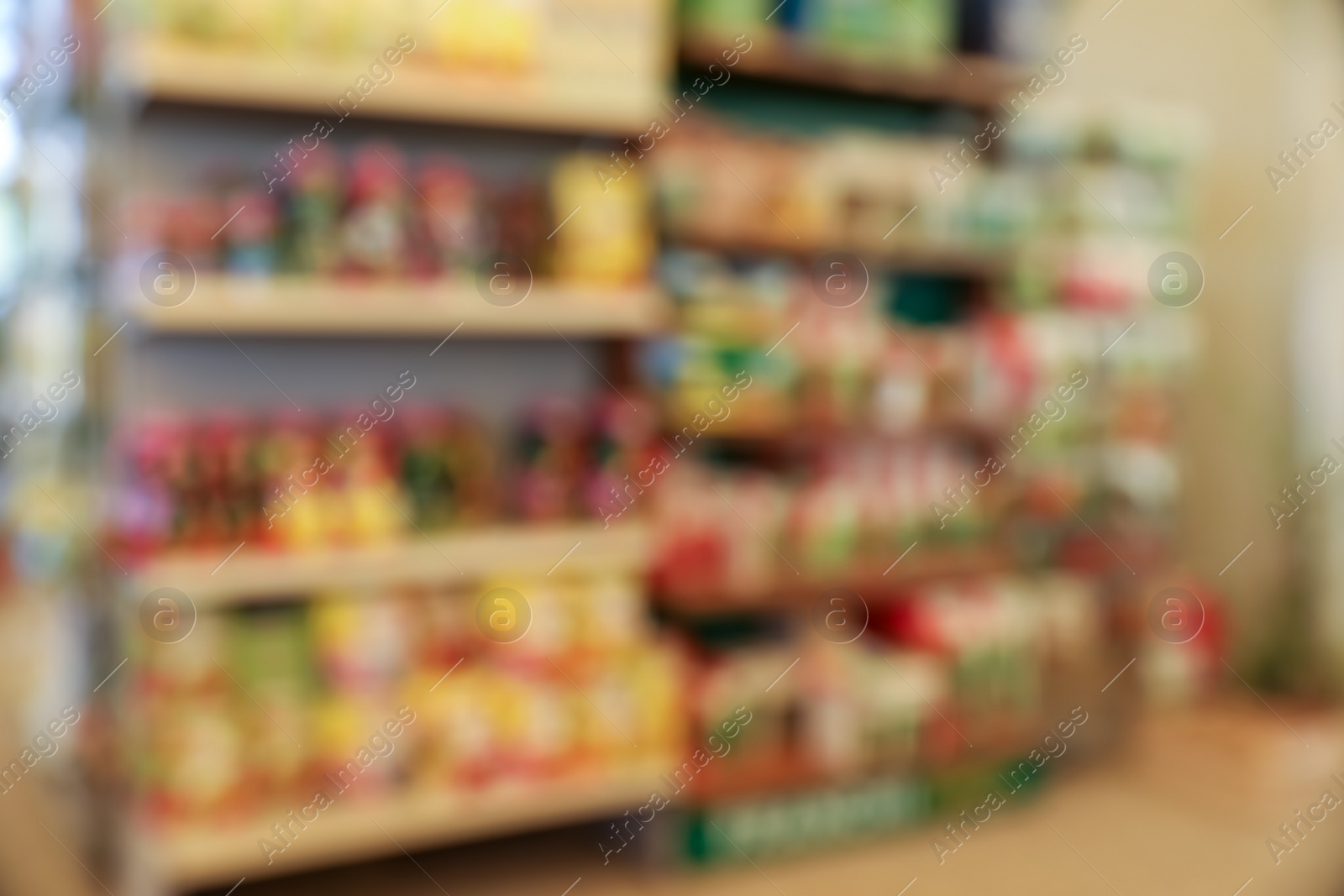 Photo of Blurred view of gardening shop with different supplies