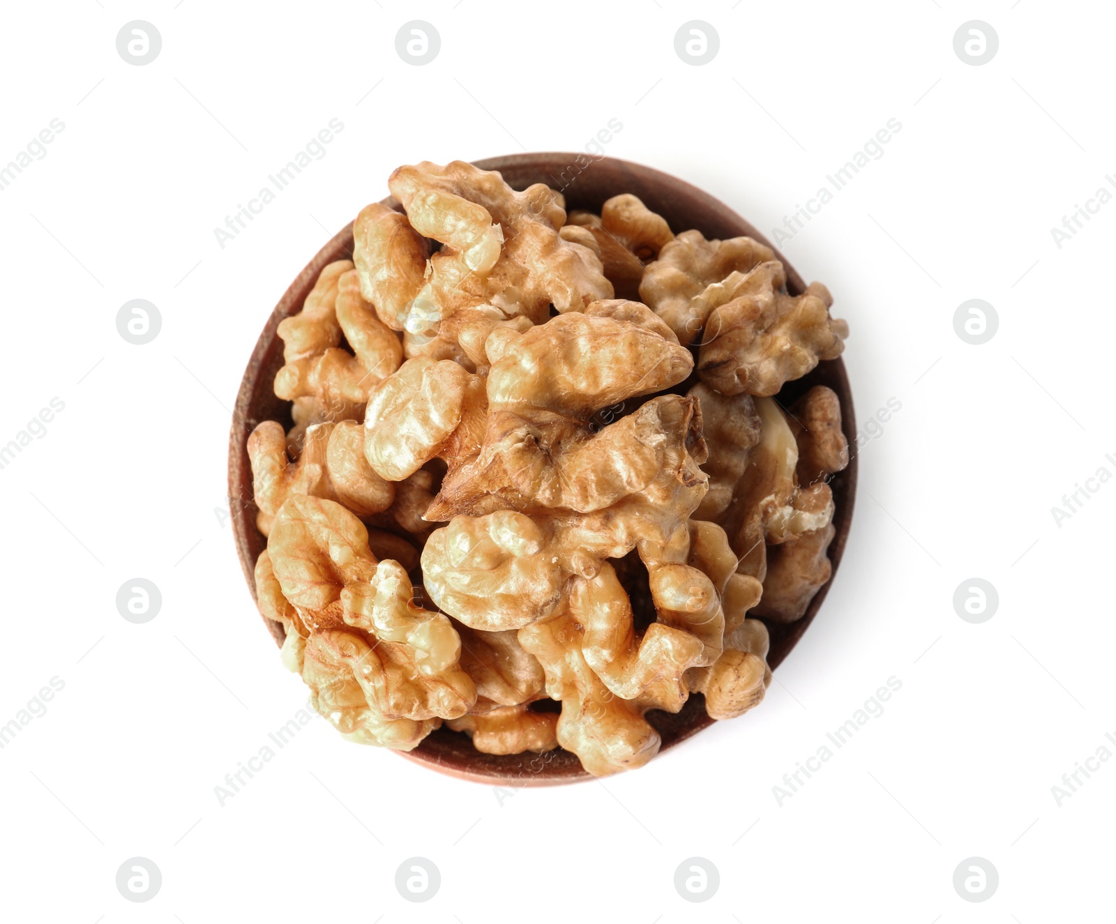 Photo of Bowl with tasty walnuts on white background, top view