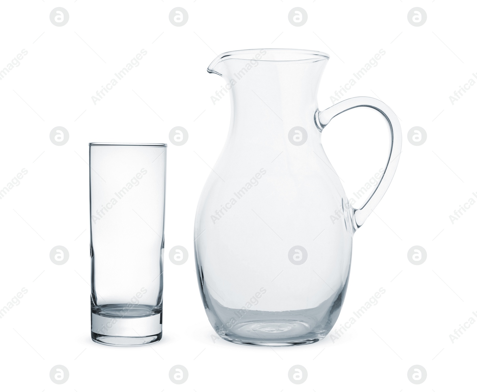 Image of Empty glass and jug isolated on white