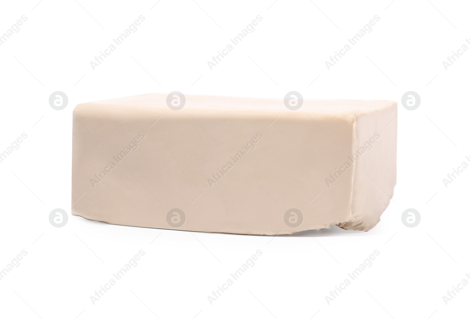 Photo of Block of compressed yeast isolated on white