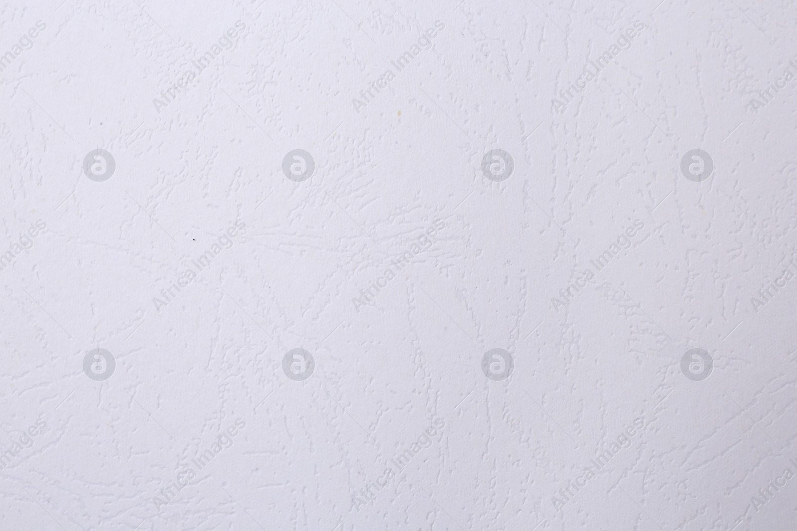 Photo of Texture of white paper sheet as background, top view