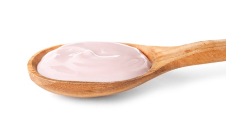 Photo of Spoon with creamy yogurt on white background, closeup