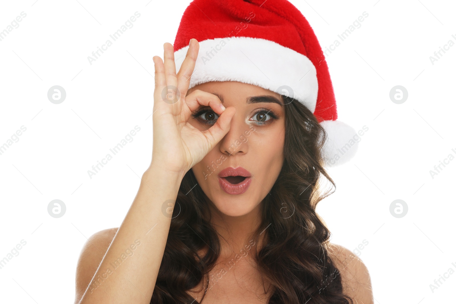 Photo of Beautiful woman in Santa hat on white background. Christmas party