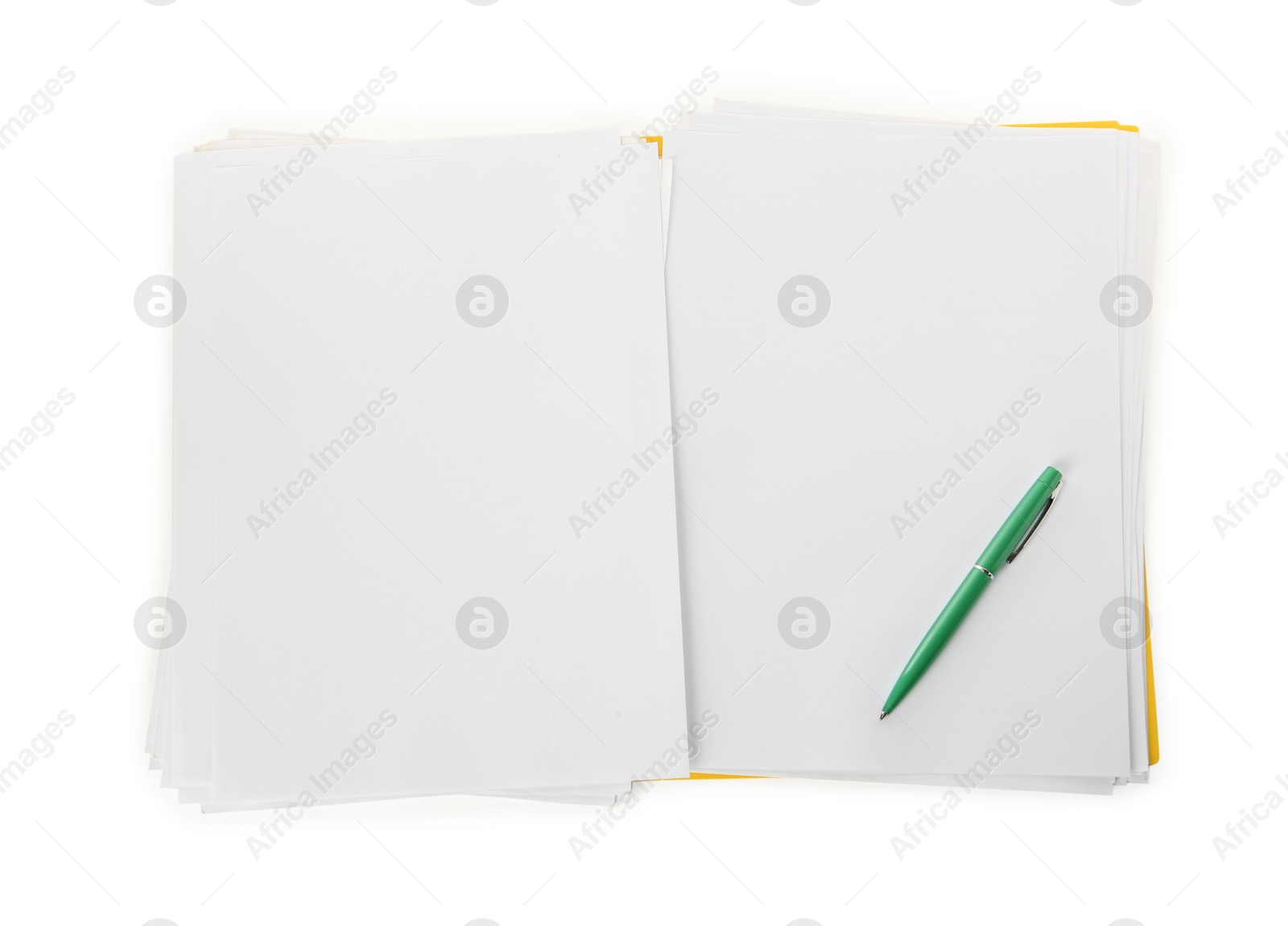 Photo of Yellow file with blank sheets of paper and green pen isolated on white, top view. Space for design