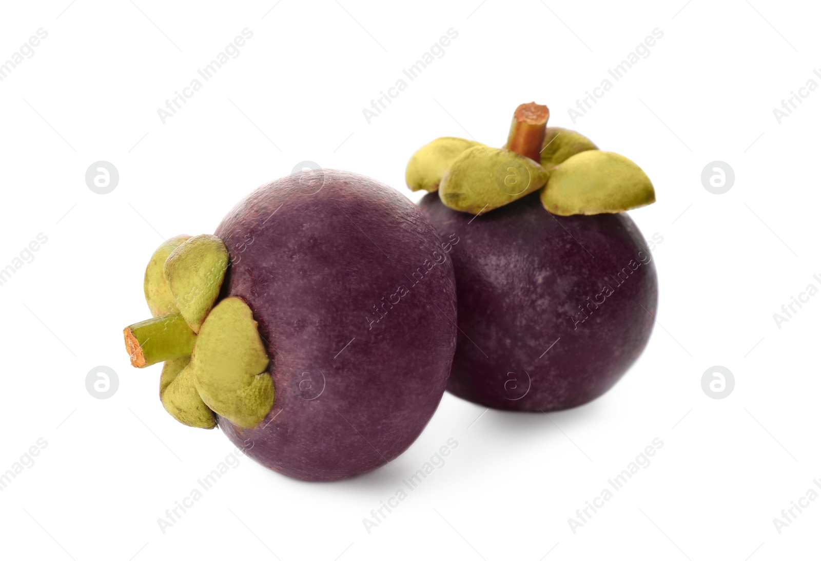 Photo of Delicious ripe mangosteen fruits on white background