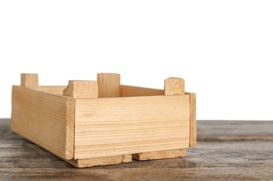 Photo of Empty rustic wooden crate on table against white background