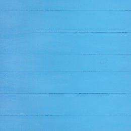 Image of Texture of light blue wooden surface as background