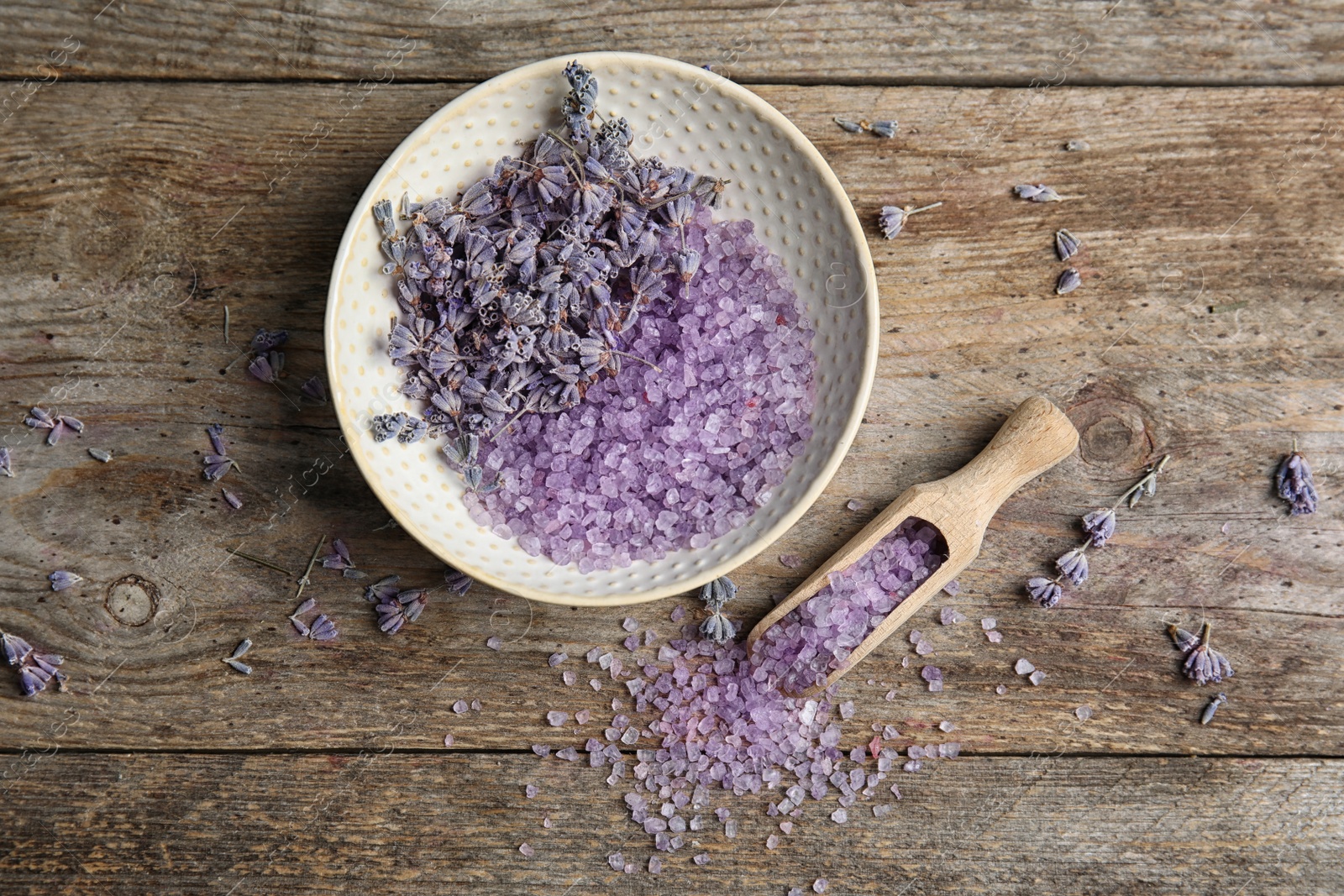 Photo of Flat lay composition with lavender flowers and natural cosmetic on wooden background