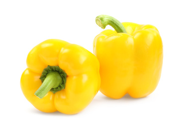 Ripe yellow bell peppers isolated on white