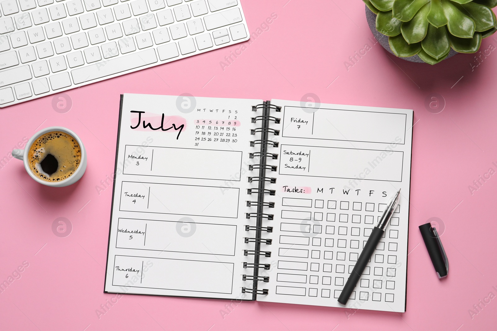 Image of Self organization with bullet journal. Notebook with calendar, empty planning lists, pen and coffee on pink table, flat lay