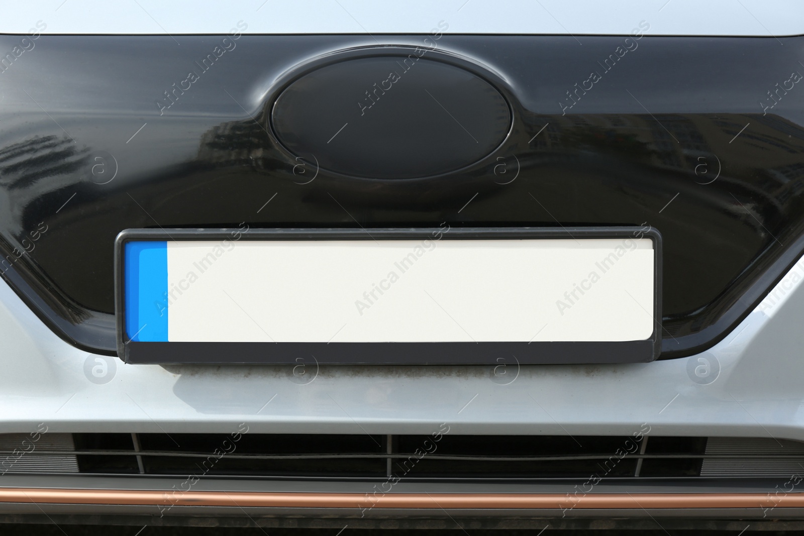 Photo of Car with vehicle registration plate, closeup view