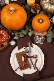 Photo of Beautiful autumn place setting and decor on table, flat lay