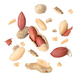 Image of Peanuts and crushed pod in air on white background