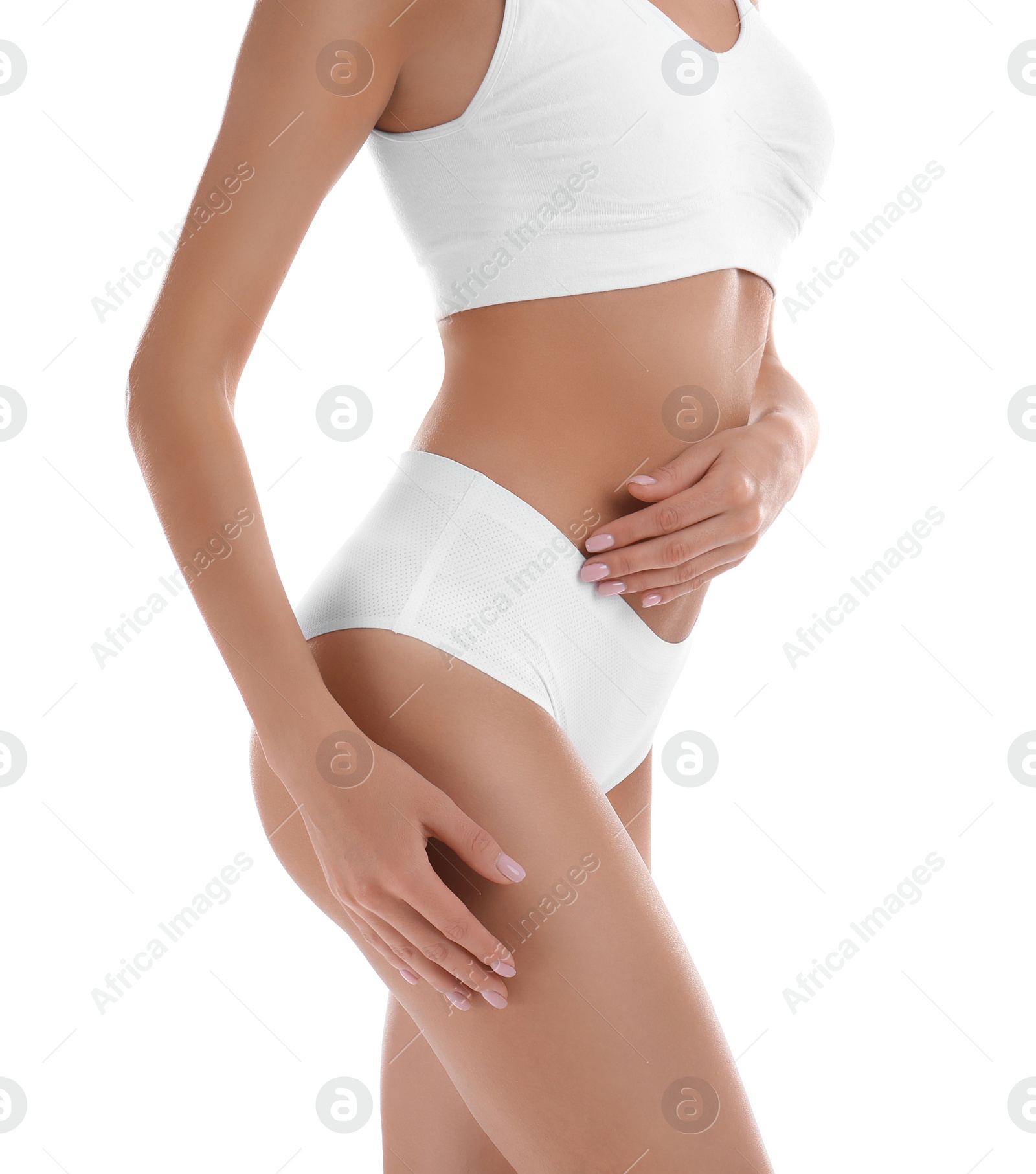 Photo of Young woman with perfect smooth skin on white background. Beauty and body care