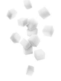 Refined sugar cubes in air on white background