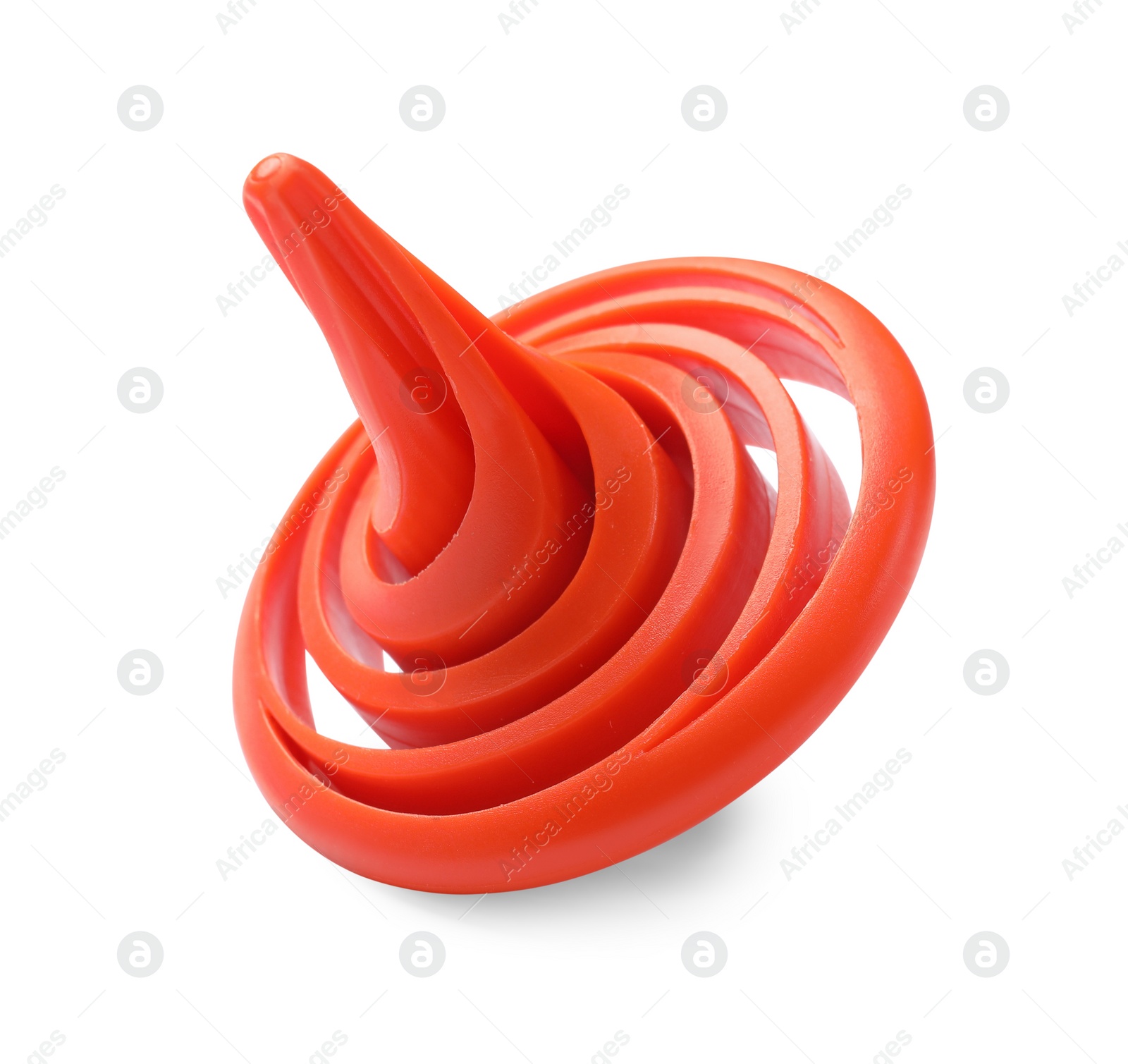 Photo of One orange spinning top on white background