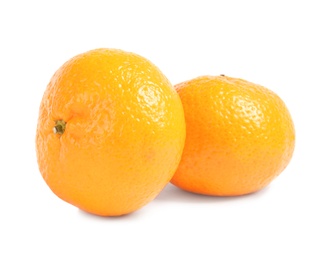 Photo of Tasty ripe tangerines on white background. Citrus fruit