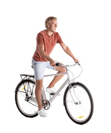 Handsome young man riding bicycle on white background