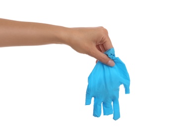 Doctor holding medical glove on white background, closeup