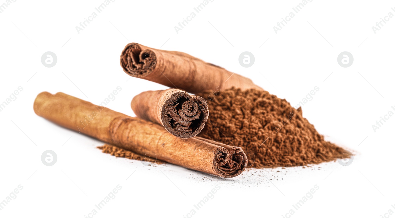 Photo of Dry aromatic cinnamon sticks and powder isolated on white