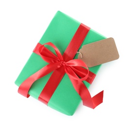 Christmas gift box decorated with ribbon bow on white background, top view