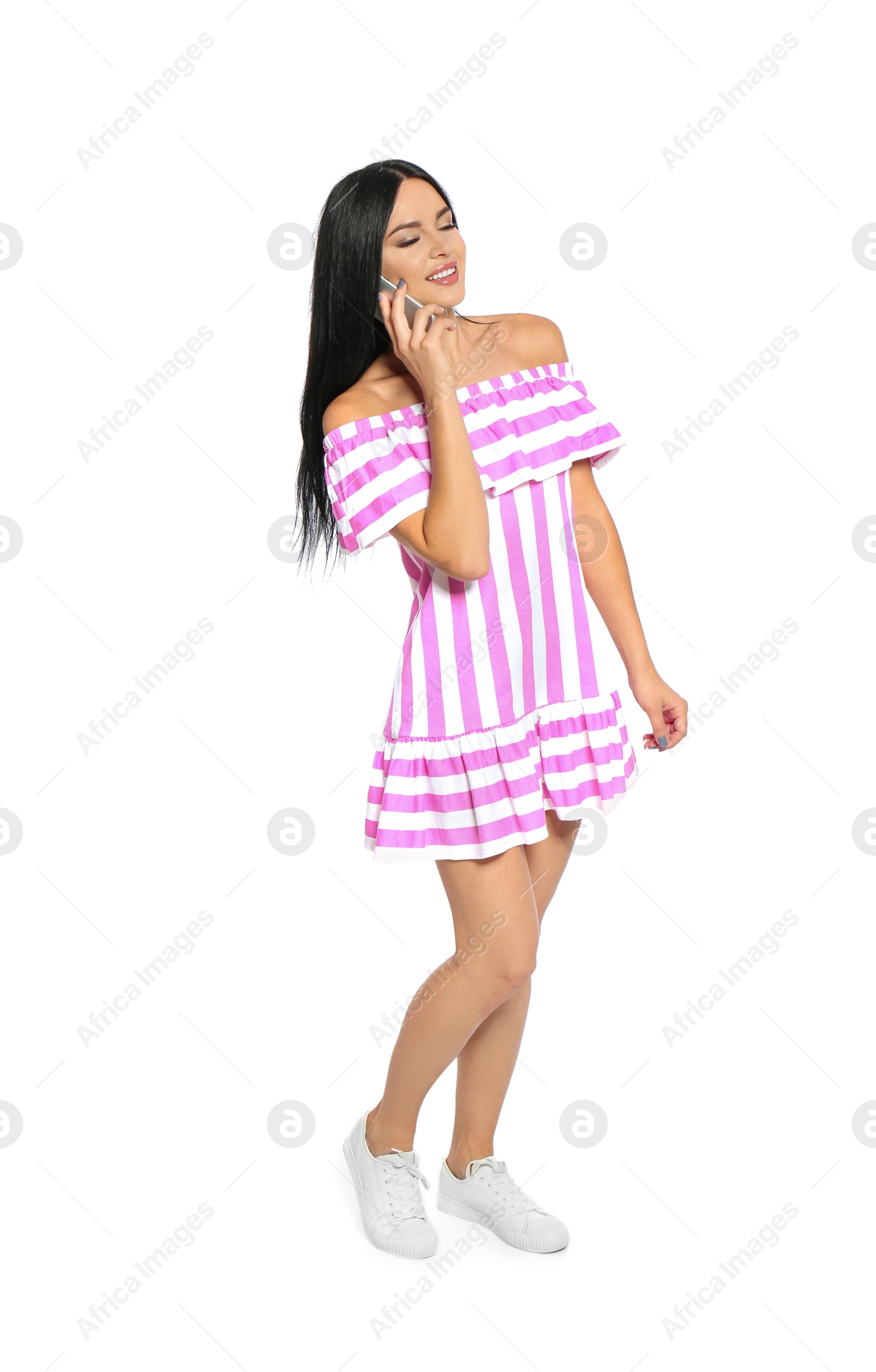 Photo of Beautiful woman talking on phone against white background