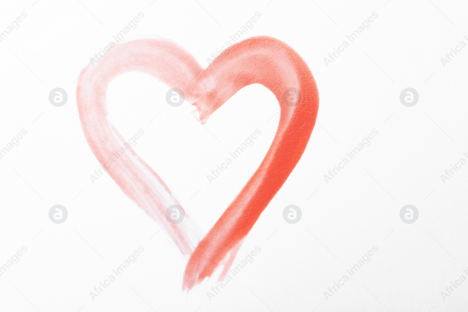 Photo of Pink heart drawn on white paper, top view