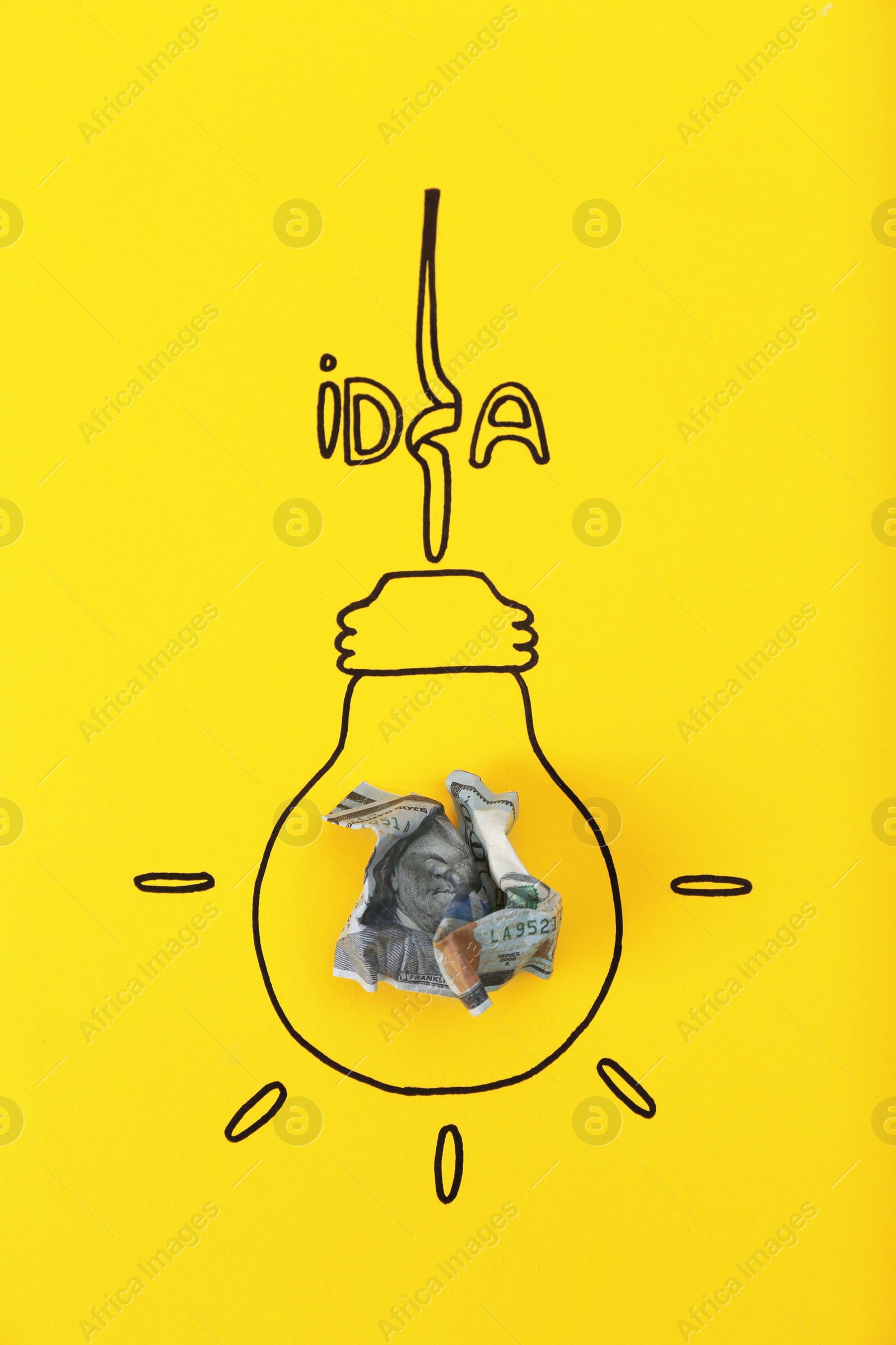 Photo of Composition with crumpled banknote, drawing of lamp bulb and word IDEA on color background. Creative concept