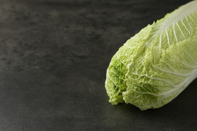 Photo of Fresh ripe Chinese cabbage on grey table, space for text