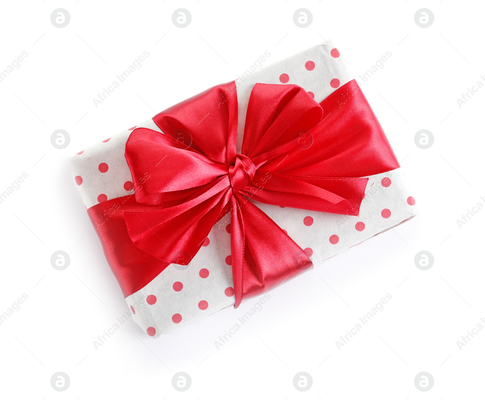 Photo of Beautifully wrapped gift box on white background, top view