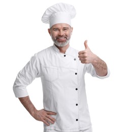 Happy chef in uniform showing thumbs up on white background