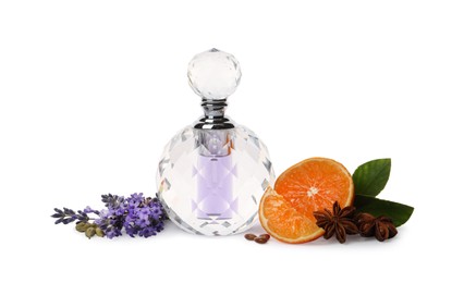 Photo of Bottle of perfume, tangerine, flowers and spices on white background