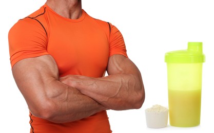 Bodybuilding. Man with muscular hands, protein powder and shaker isolated on white