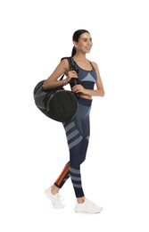 Beautiful woman with sports bag on white background