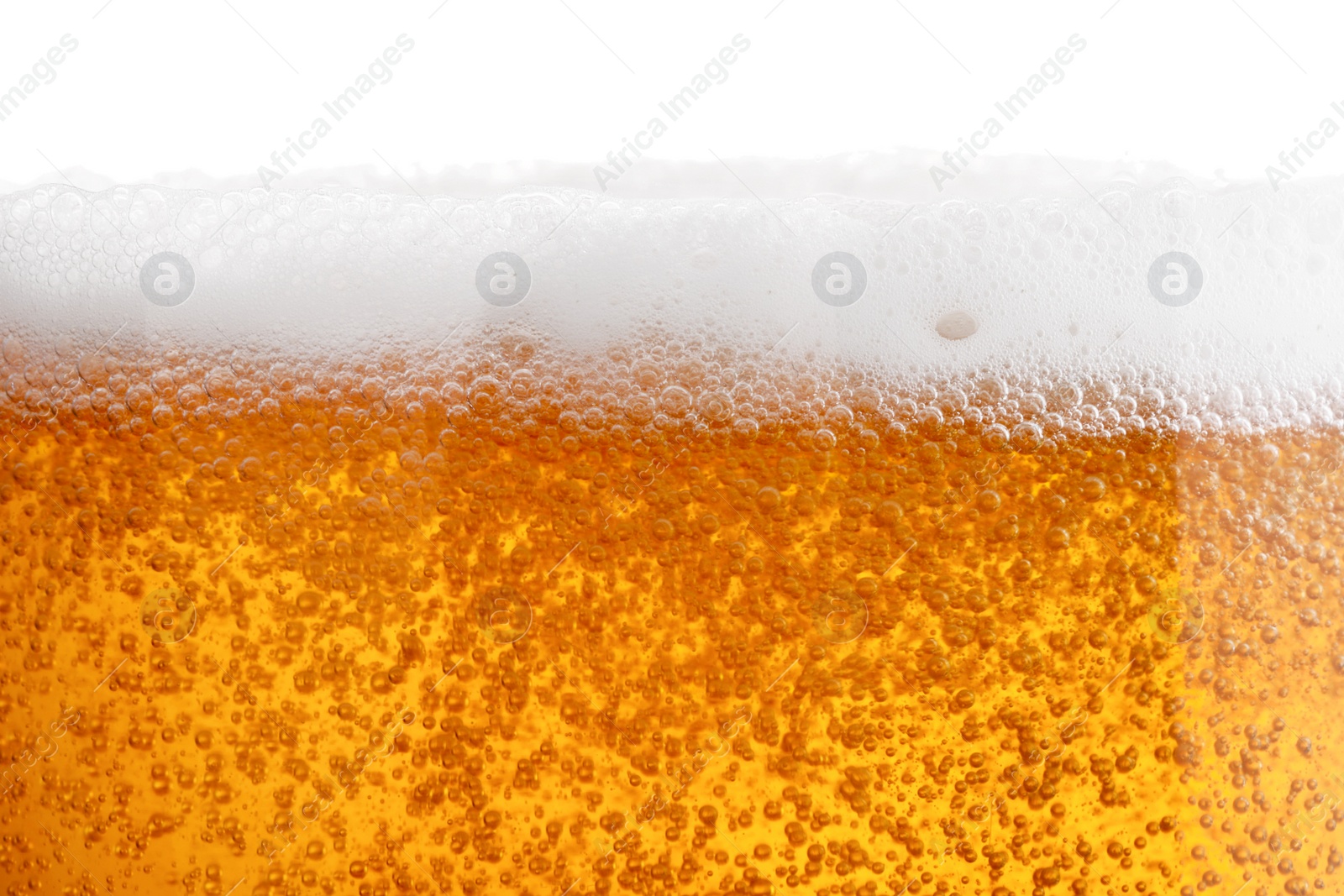 Photo of Tasty beer with foam in glass, closeup