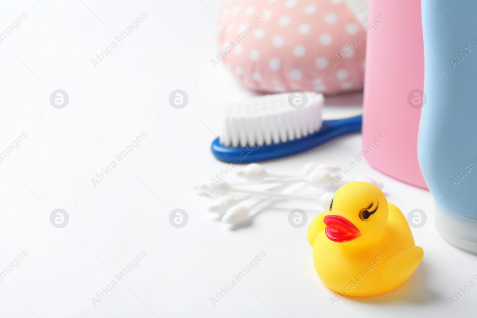 Photo of Baby accessories on white background. Space for text