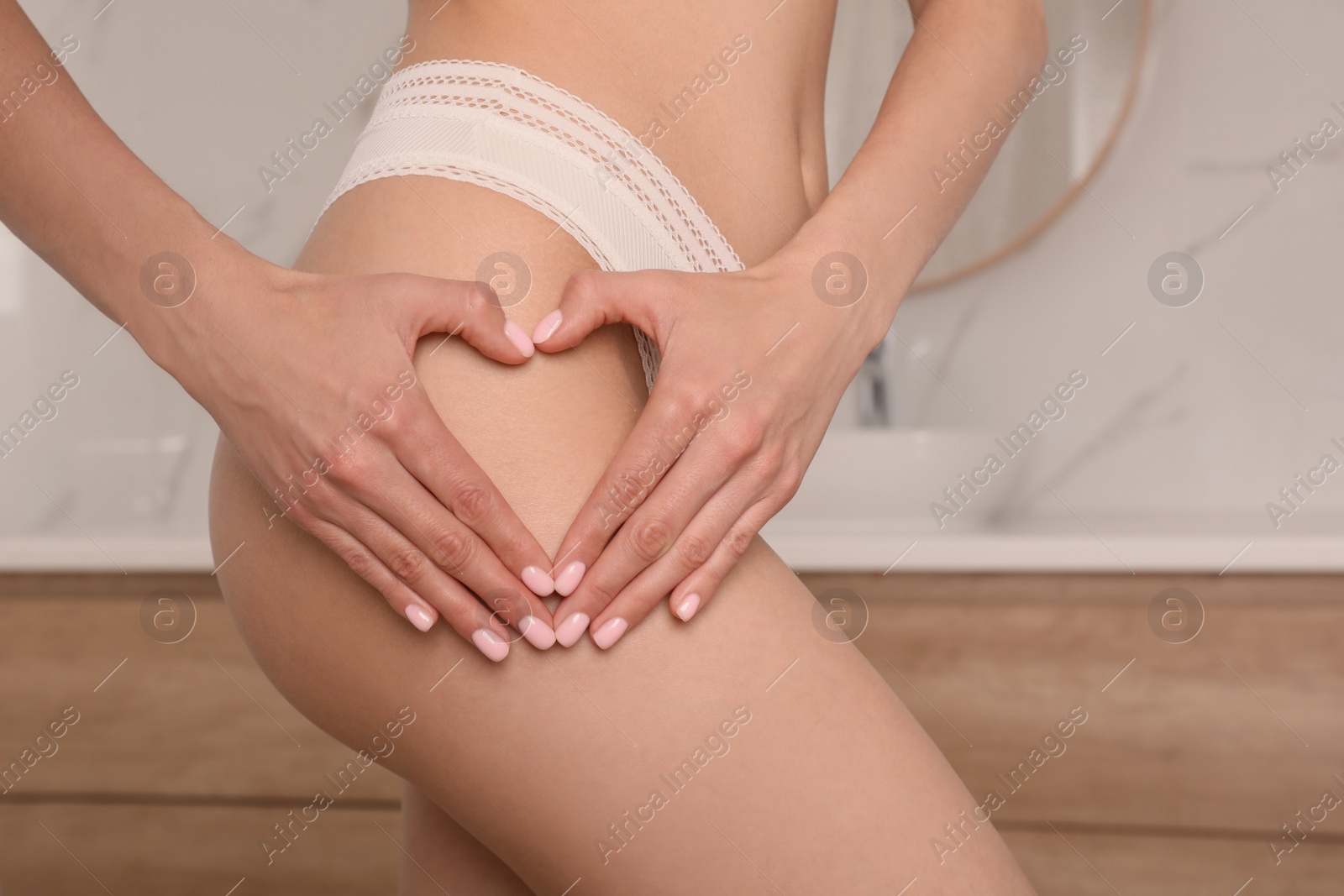 Photo of Closeup view of slim woman in underwear at home. Cellulite problem concept