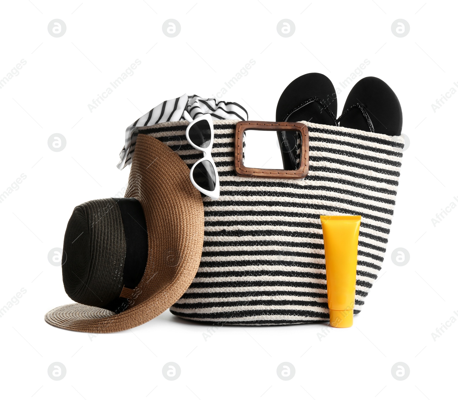 Photo of Set of beach accessories on white background