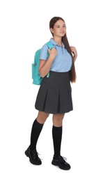 Teenage girl in school uniform with backpack on white background