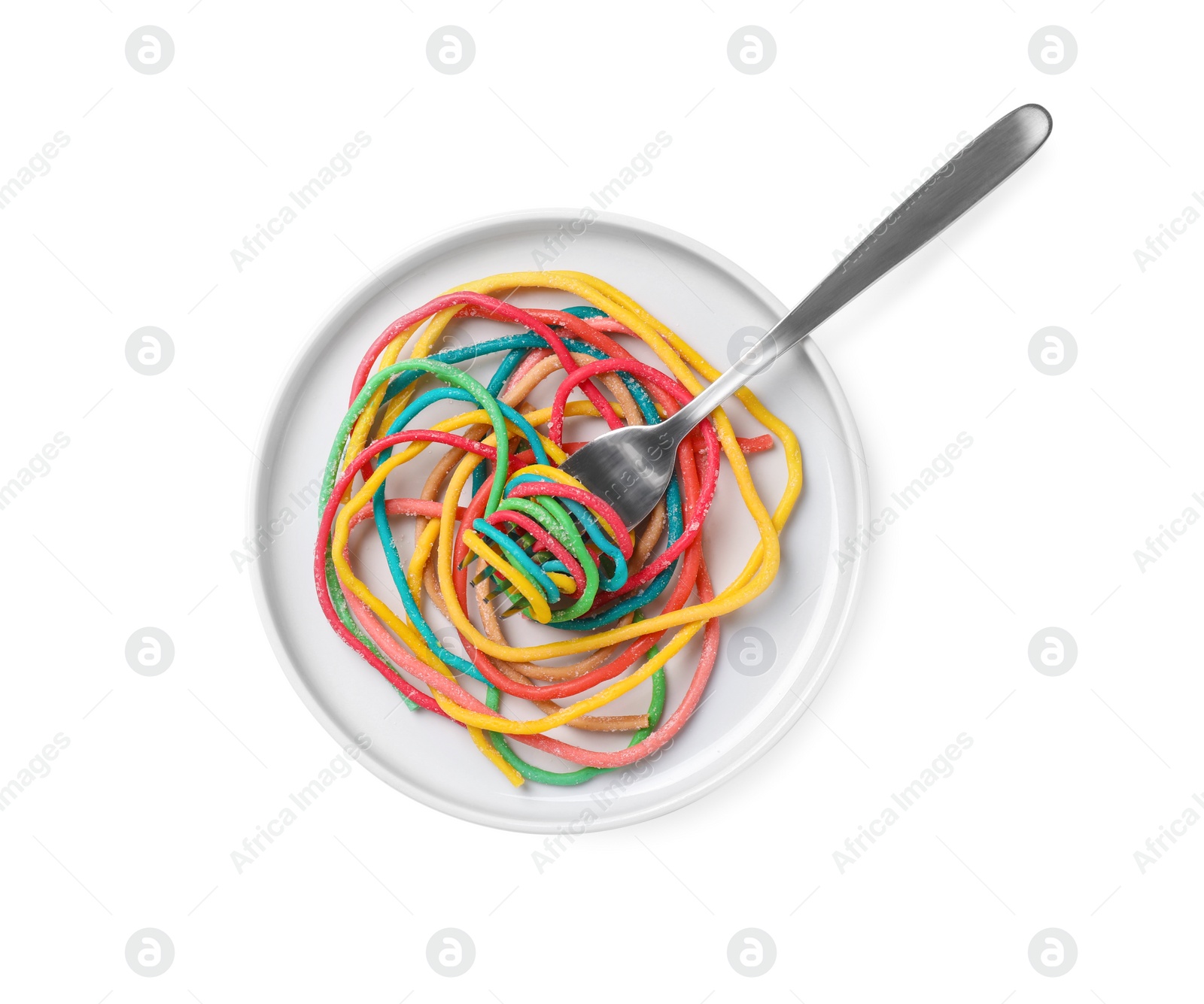 Photo of Colorful sweet gummy strings served as spaghetti on white background, top view. April Fools' Day