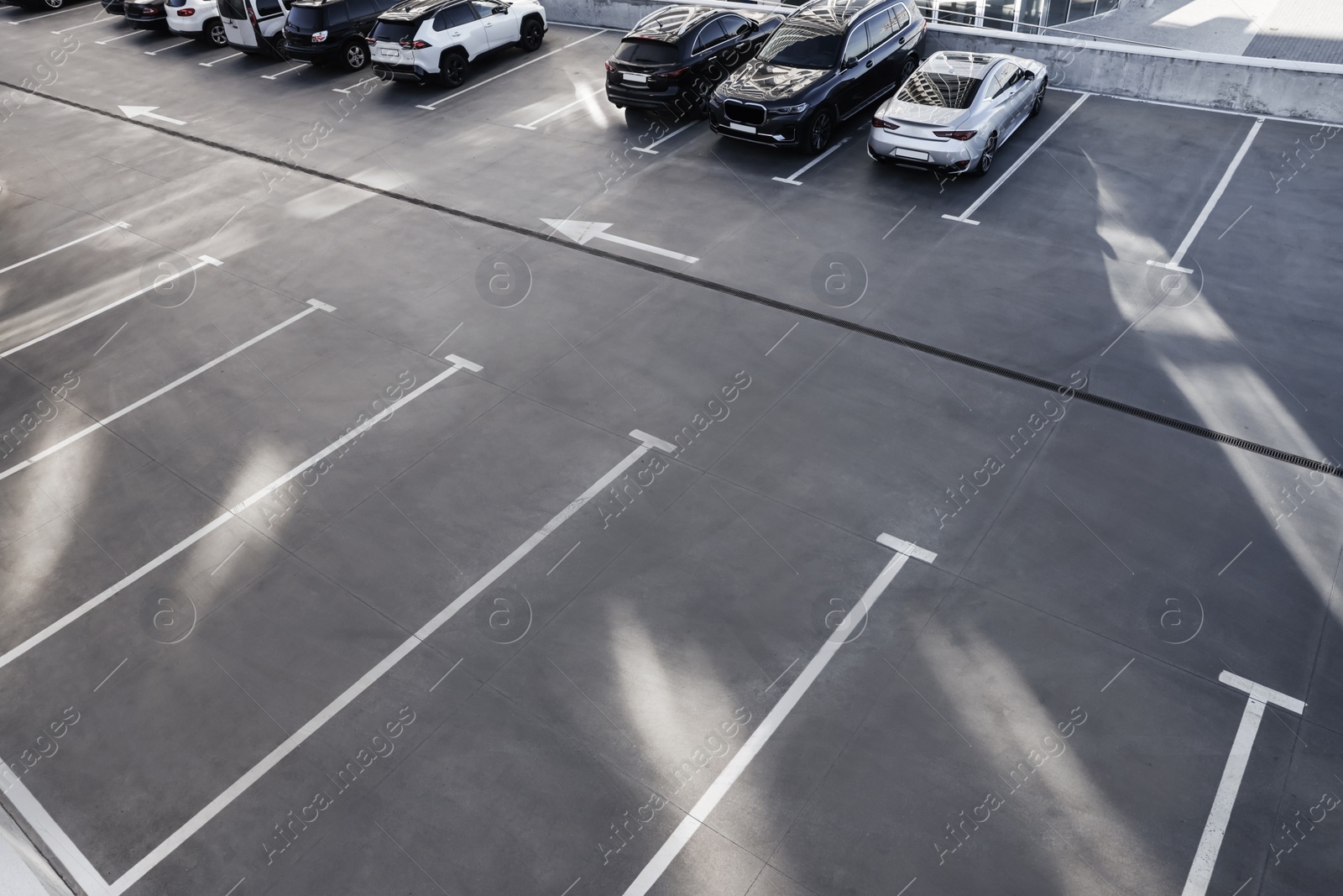 Photo of Outdoor car parking lot on sunny day